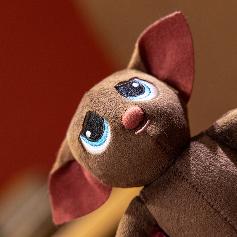 Close view of embroidered fantasy bat expression