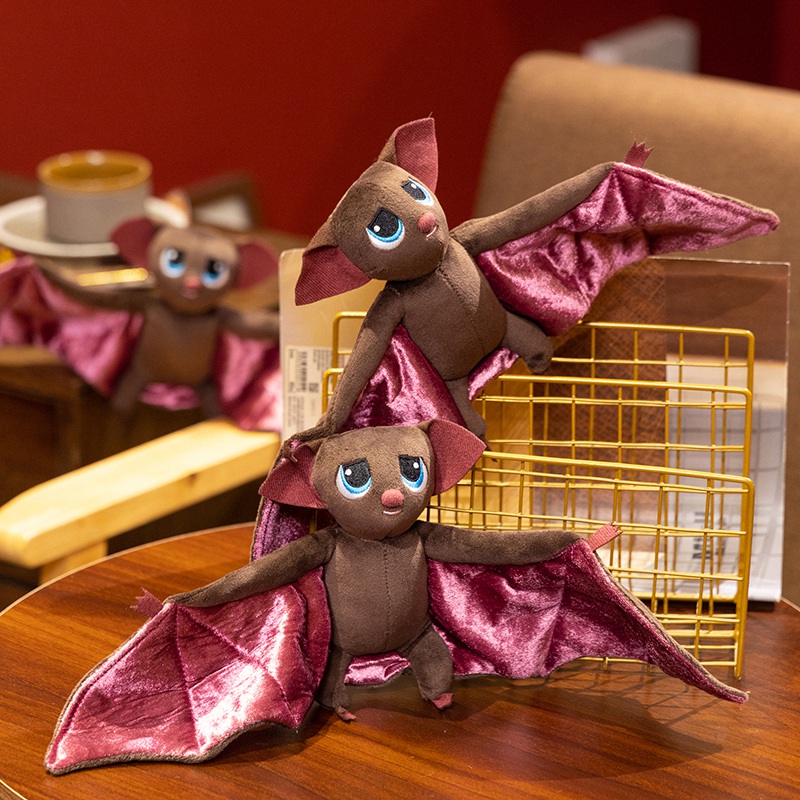Fantasy bat plush shown in a small character group