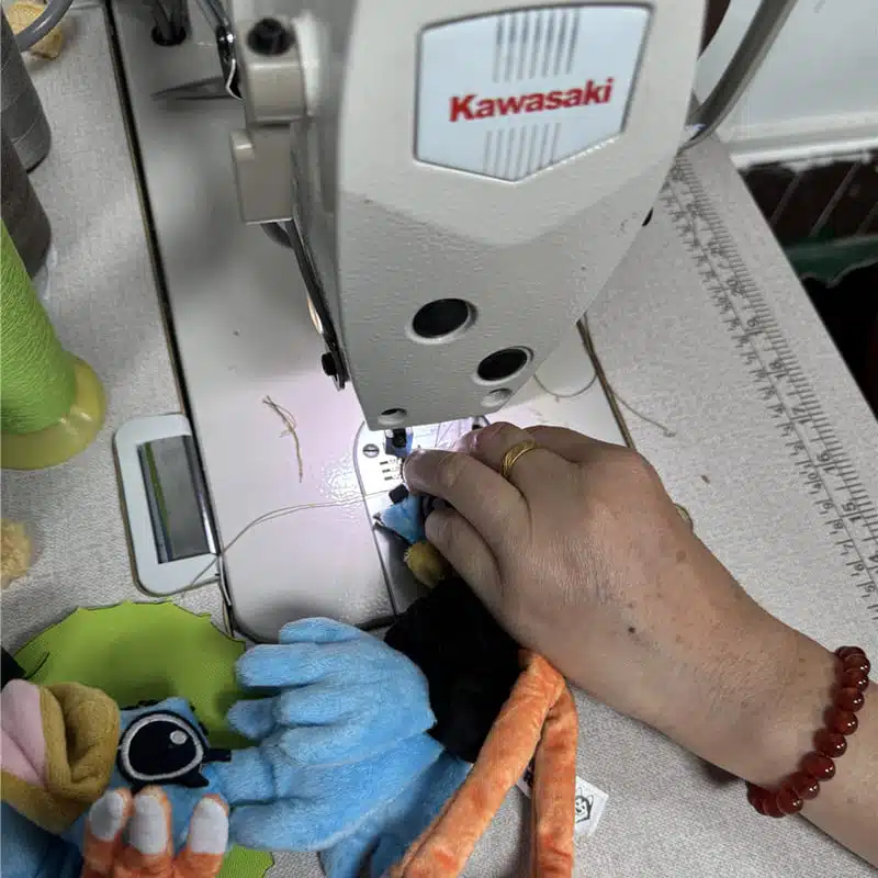 Sewing process for dimensional plush features